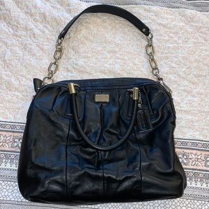 Coach chain leather bag w/ pink lined inside.